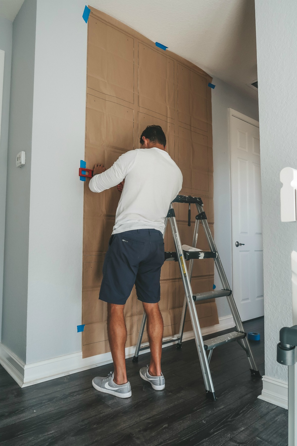 how to hang a gallery wall, how to hang a floor to ceiling gallery wall